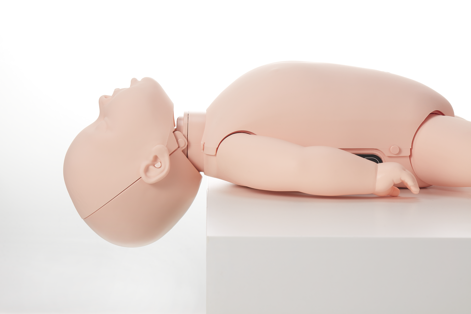 Brayden Baby illuminating CPR manikin showing full head tilt backwards
