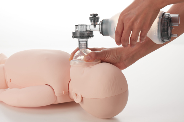 Brayden Baby illuminating CPR manikinhead view showing bag ventilation